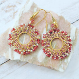 Boucles d'oreilles créoles Pétale corail dorées