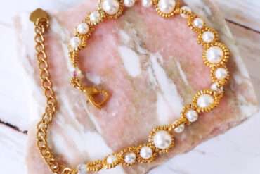 Bracelet blanc doré cosmos