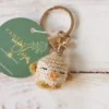 Petit oiseau beige porte-clés au crochet