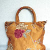 Sac orange avec fleurs